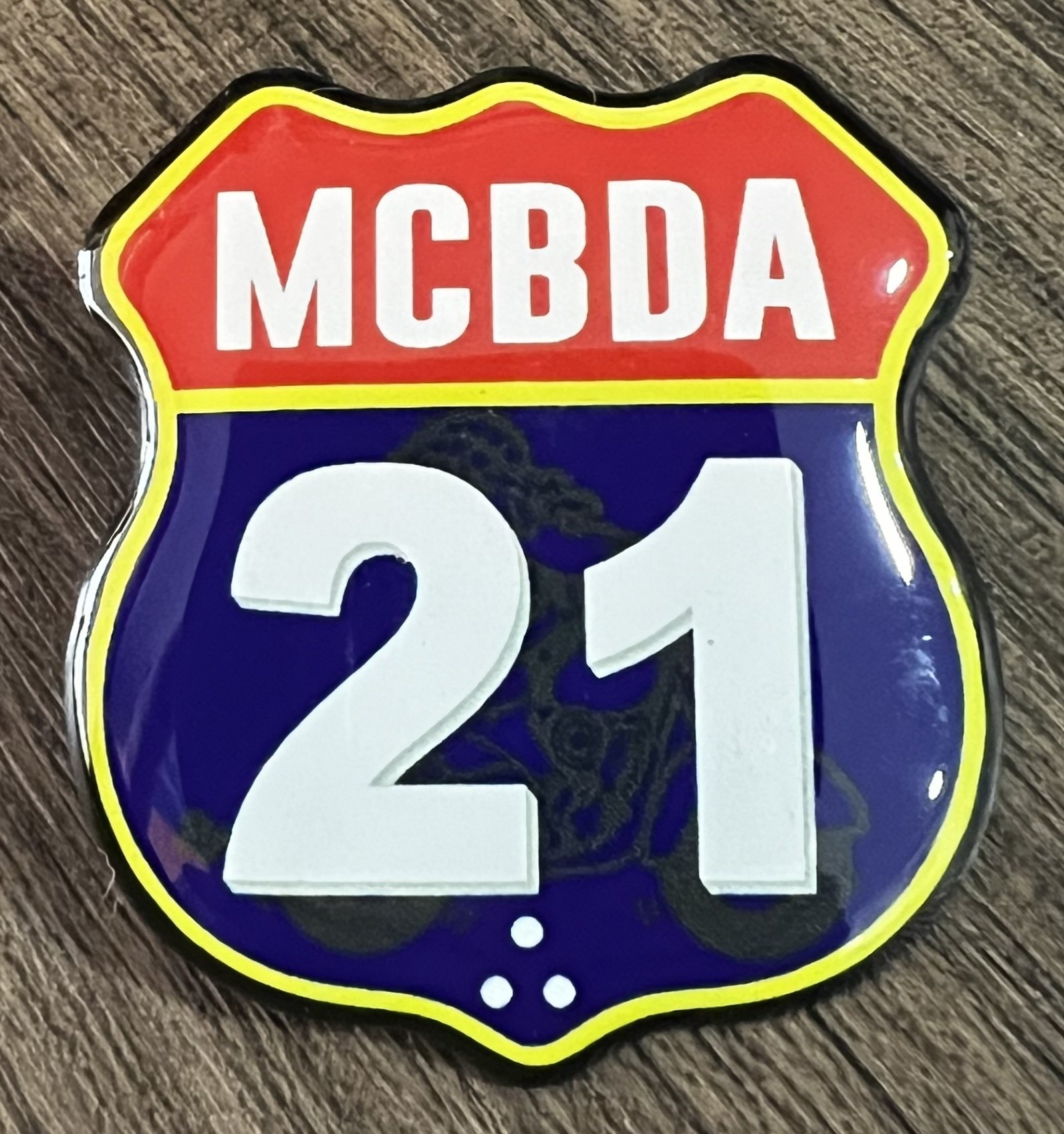 Botton 21 anos MCBDA